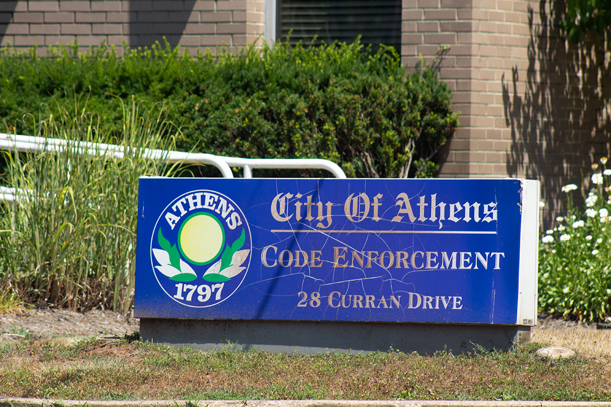 The sign in front of the Athens code enforcement office
