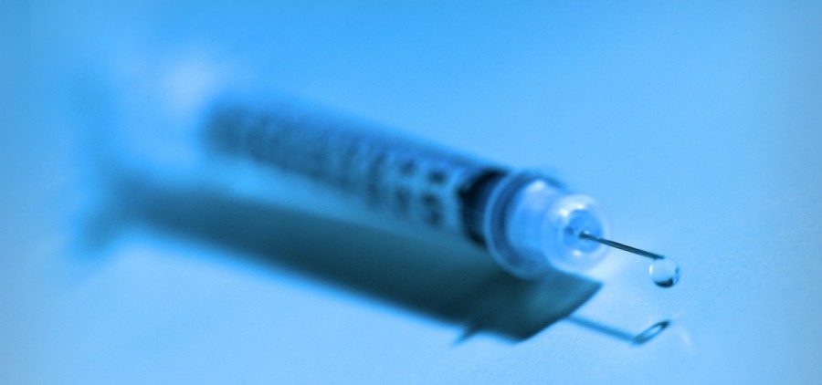 A syringe drips