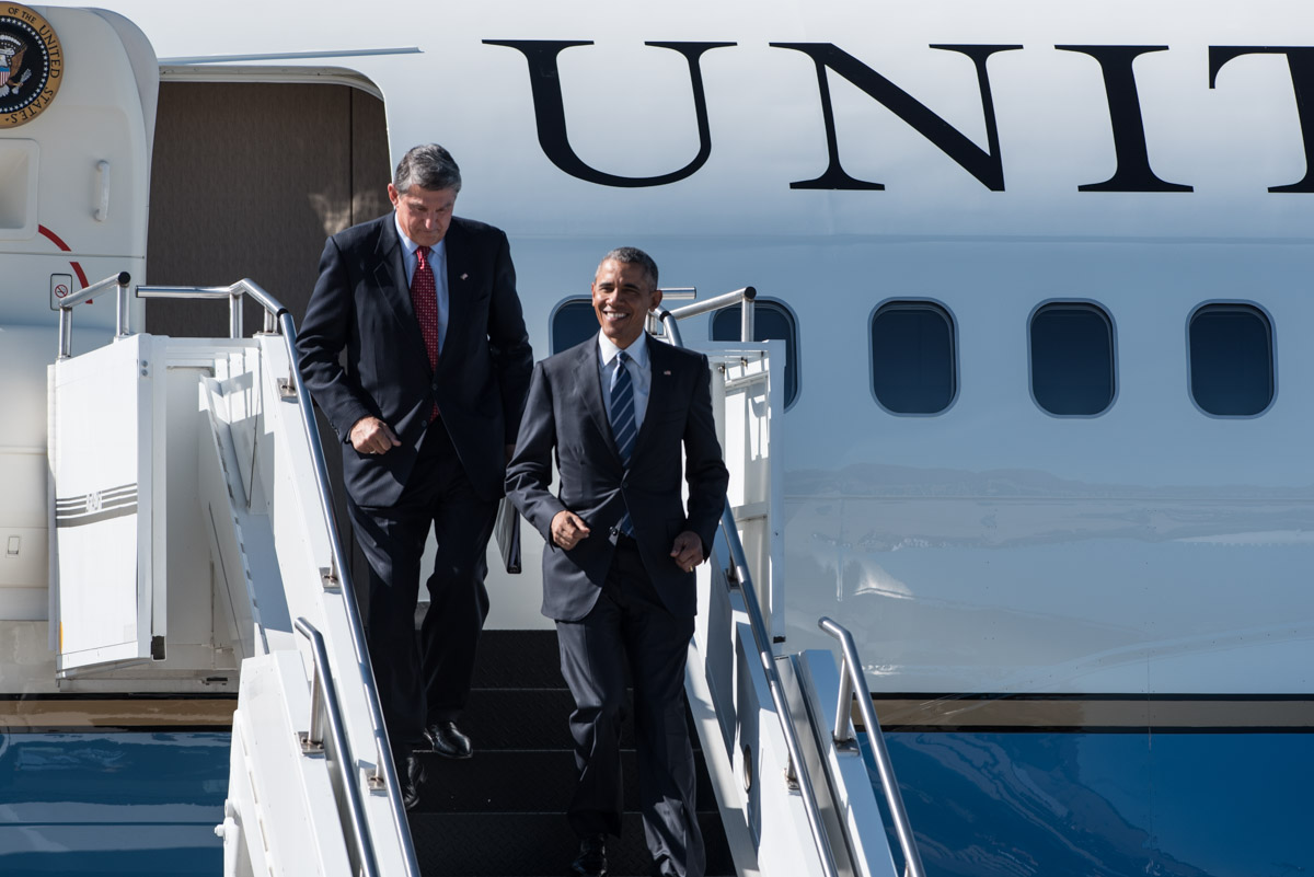 President Barack Obama and Sen. Joe Manchin, D-W.Va. walk down the stairs of  Air Force One upon their arrival at McLaughlin Air National Guard Base in Charleston, W.Va on Wednesday, Oct. 21, 2015. (Yi-Ke Peng/WOUB)