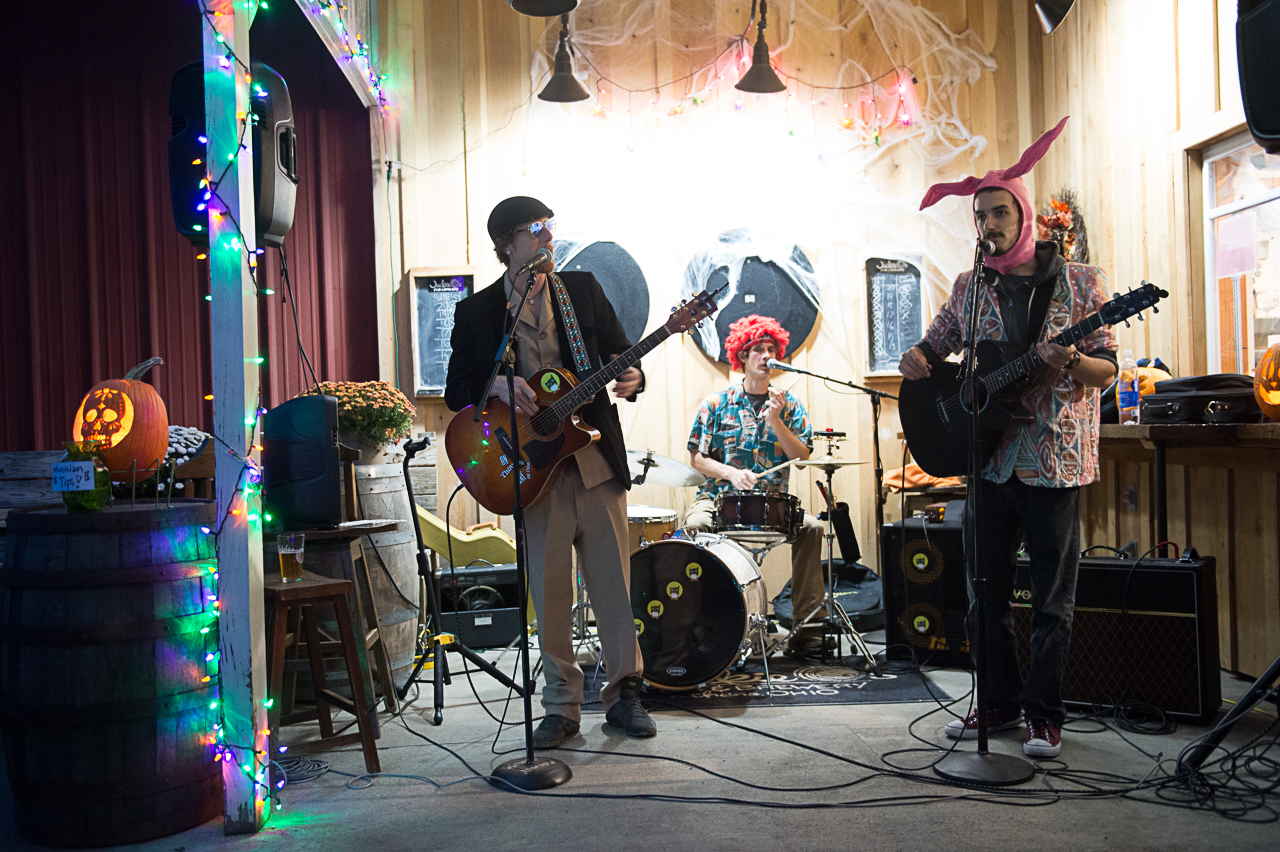 Bright @ Night performs at Jackie O’s Brewery to help kick off the month long art show of Kevin Morgan that features all of his Halloween designs for the past 34 years with many patrons dressing up in costumes on October 25, 2015 in Athens, Ohio. (Robert McGraw/WOUB)