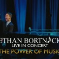 Ethan Bortnick singing on stage