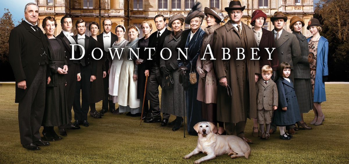 Downton Abbey stars in front of castle