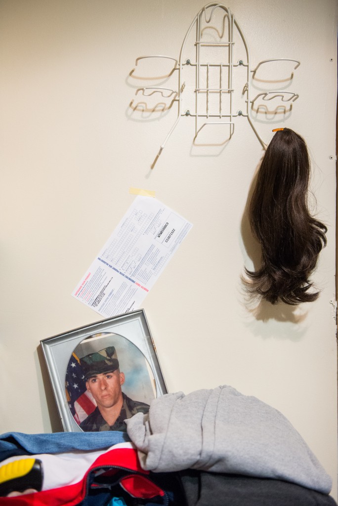 A photograph of Dwayne “Duey” Barley taken during his time in the U.S. Army sits in the family’s laundry room.
