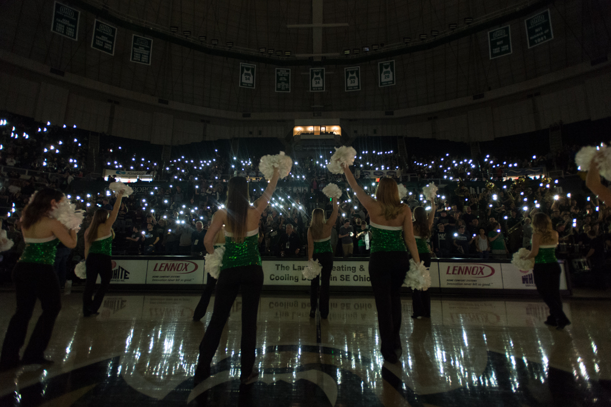 The Ohio University Dance Team pumps up the O-Zone student section in the Convocation Center during the introduction of the Bobcat starters against Northern Illinois University on Saturday. (Nicole Raucheisen/WOUB)
