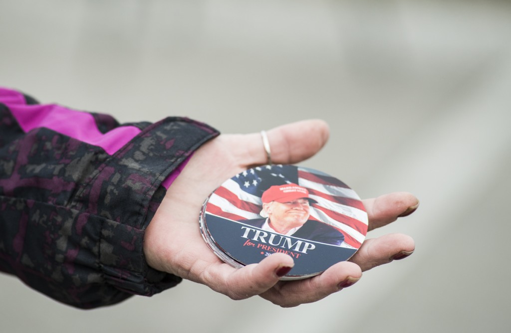 Donald Trump supporters sell campaign buttons before the rally in Columbus, Ohio on March 1, 2016. (Robert McGraw/WOUB)