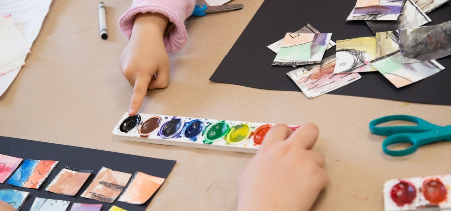 Area children finger paint at a recent Family Art Encounters workshop at the Kennedy Museum of Art. (Robert McGraw/WOUB)