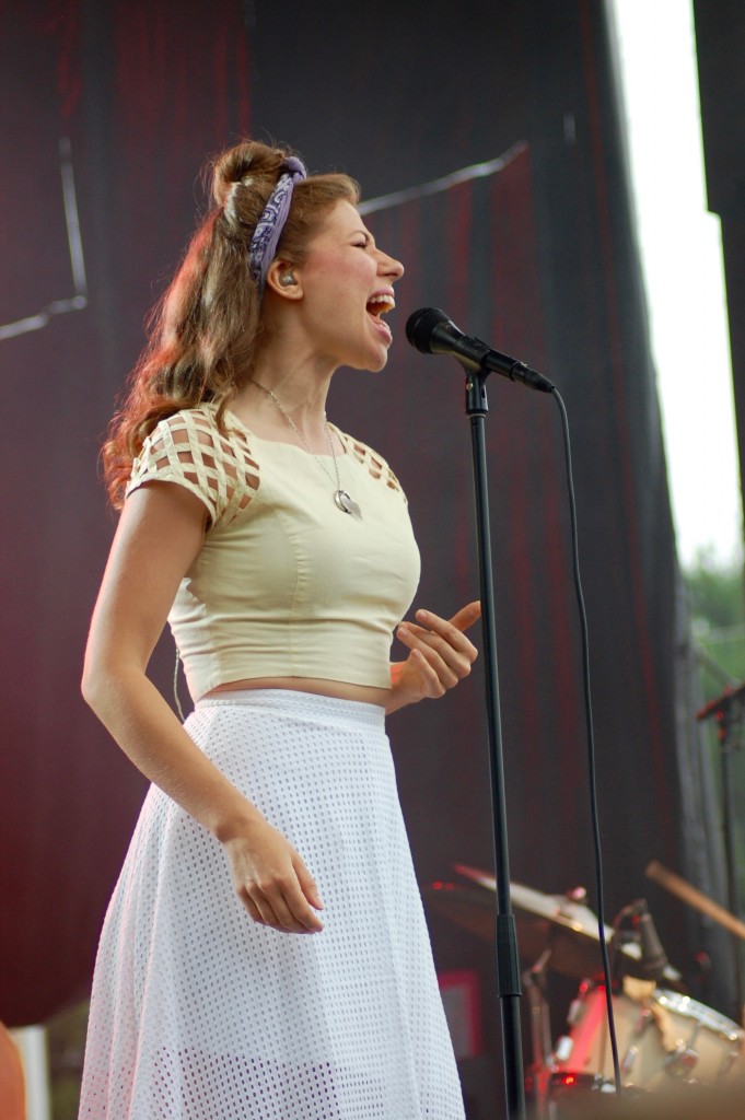 Rachael Price of Brooklyn-based Lake Street Dive during the band's thrilling, very wet set Saturday afternoon. (WOUB/Shelby Coulter)