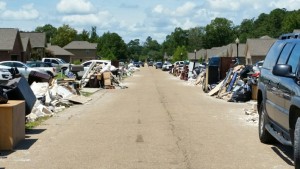 A street in Hammond, Louisiana, is lined with items damaged by record floods in the area. Photo courtesy of Dean McNeal