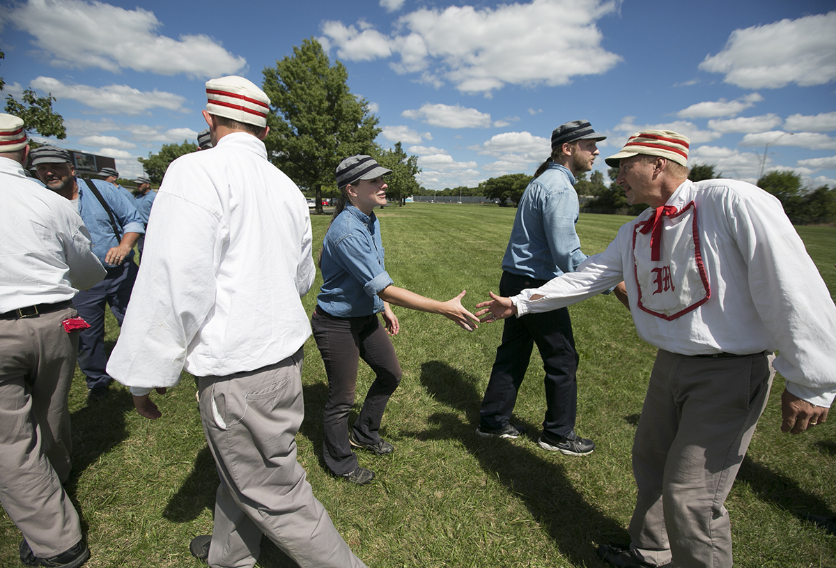 Nettey “KlinkKlunk” Johnson, left, and Mike Purcell, right, shake hands after a vintage baseball game at the Ohio Cup on Saturday.  (WOUB/Jennifer Coombes)