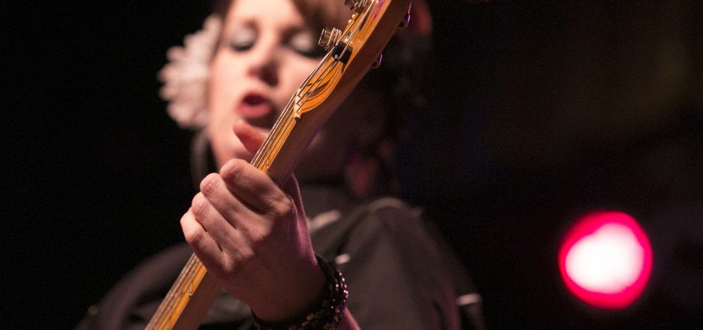 Southern Culture on the Skids bassist Mary Huff plays a riff of their rockabilly surfer rock sound during the band’s performance Friday night at Stuart’s Opera House in Nelsonville. (WOUB/Jennifer Coombes)