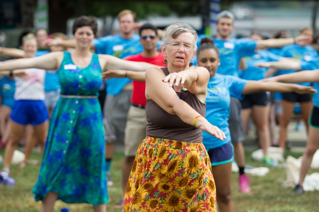 Richa Christine Eland of Sri Health Yoga Studios, leads a stretch for participants prior to a charity walk for the  National Eating Disorder Association at West State Street Park on September 10, 2016.
