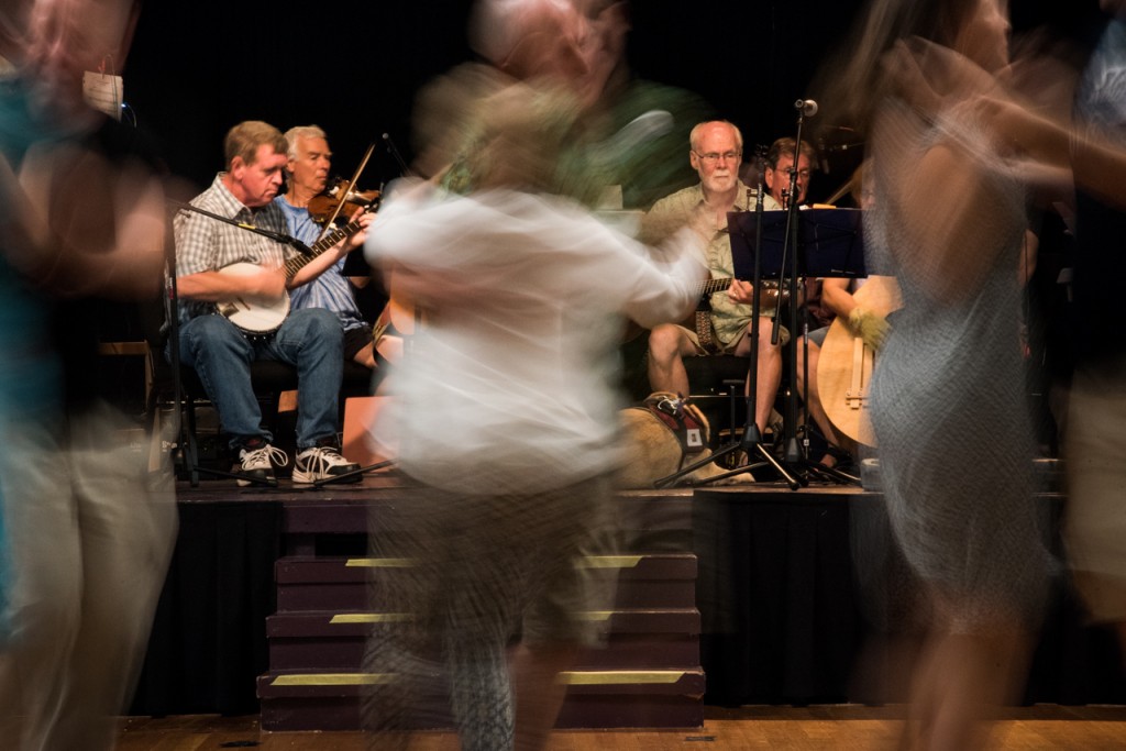 Tom Cullinan (left) playing the banjo and Frank Phillips (right) playing the guitar in The Three Rivers String Band during Contra Dancing in Athens, Ohio, on September 10, 2016.