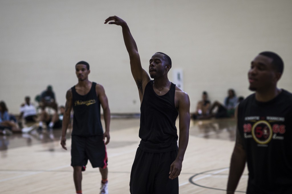 A student at Ohio University participates in the Old School, New School basketball game for the Black Alumni Reunion on September 17, 2016. (MICHAEL SWENSEN/WOUB)