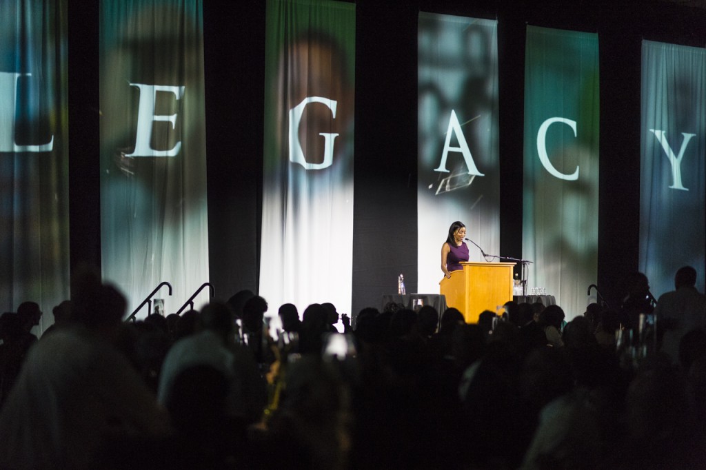 Alicia Henry, a graduate of class of 2009 gives the opening speech during the Black Alumni Reunion Gala in the Baker Ballroom at Ohio University on September 16, 2016. (MICHAEL SWENSEN/WOUB)