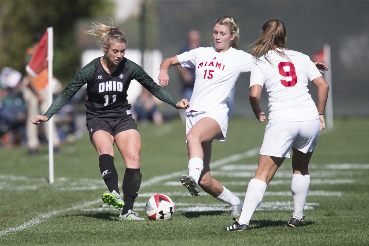 Ohio University's Alexis Milesky dribbles through defenders during a home game against Miami at Chessa Field on October 23, 2016.  Ohio defeated Miami 2-0. (Michael Johnson/WOUB)