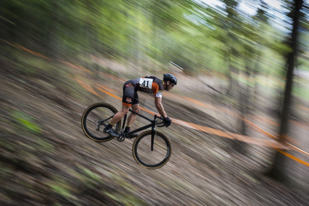 A cyclocross rider decents down a hill  during a race at the Hocking River Rumble on October 1, 2016. (Michael Swensen/WOUB)
