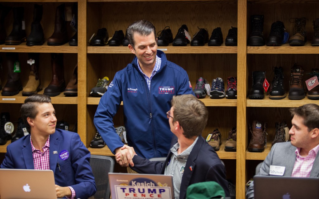 Don Trump Jr. shakes the hand of Ohio University students who have spent the presidential campaign making phone calls to raise support for Don Trump Jr.'s father, presidential candidate Donald Trump.  (WOUB/Erin Clark)