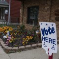 A sign outside of the Nelsonville voter precinct lets people know where they can vote.