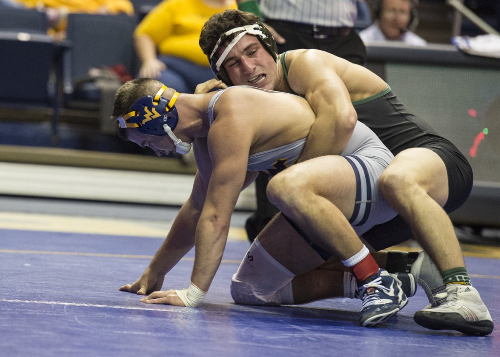 Arsen Ashughyan, right, at the WVU Mountaineer Quad on November 6, 2016, in Morgantown, W.Va. He would go on to win all three of his matches against Pittsburgh, Campbell, and WVU. (Robert McGraw/WOUB)