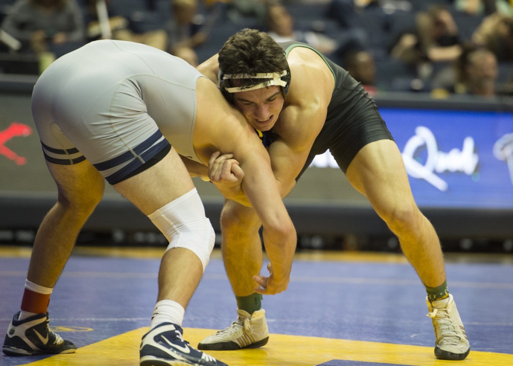 Arsen Ashughyan, right, at the WVU Mountaineer Quad on November 6, 2016, in Morgantown, W.Va. He would go on to win all three of his matches against Pittsburgh, Campbell, and WVU. (Robert McGraw/WOUB)