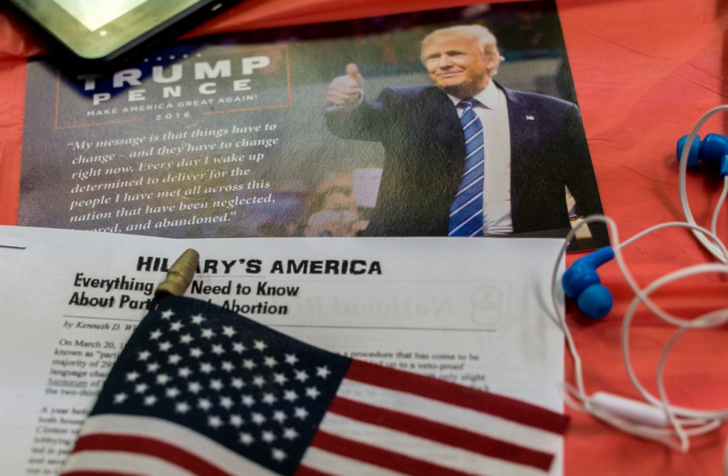 Papers sitting underneath a small American Flag during the Athens County Republican watch party in Athens, Ohio, on November 8, 2016.  (Carolyn Rogers/ WOUB)