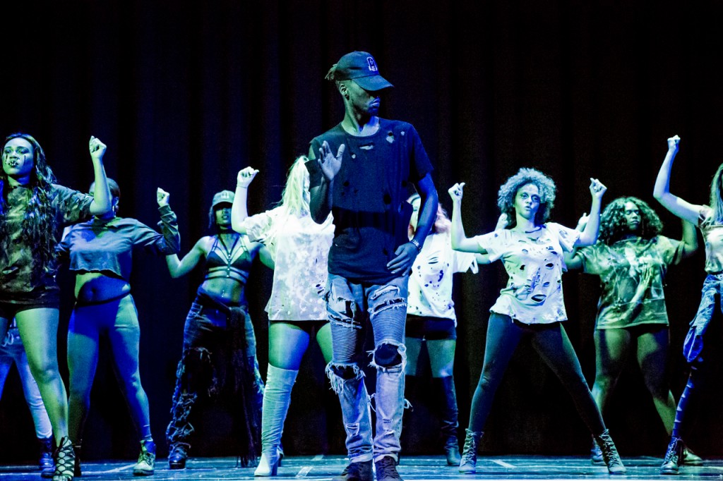 Tae Shawn Raymore leads the dancers during the Zombie Apocolypse Friday night at Baker Center. The annual Halloween fashion show is sponsored by OU magazine, The Scene. (photo by Sallie Sauber)