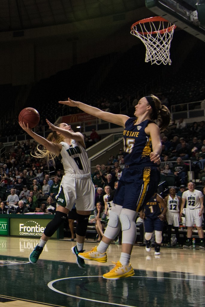 Ohio University's Taylor Agler goes for a layup against Kent State's Jordan Korinek in a close game between Ohio University and Kent State at the Convocation Center on January 14, 2017. Kent State defeated Ohio University 68-65. (Nickolas Oatley/WOUB)
