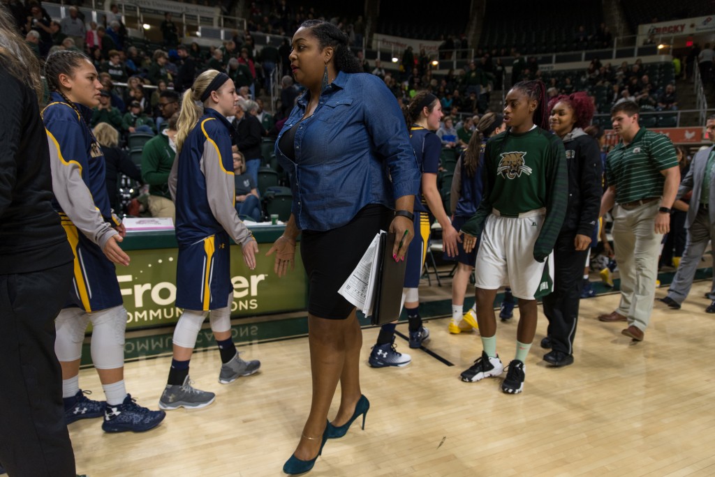 Kent State and Ohio University players and team high five after Kent State defeated Ohio University 68-65 during a Women's basketball game at the Convocation Center on January 14, 2017.(NICKOLAS OATLEY | WOUB)