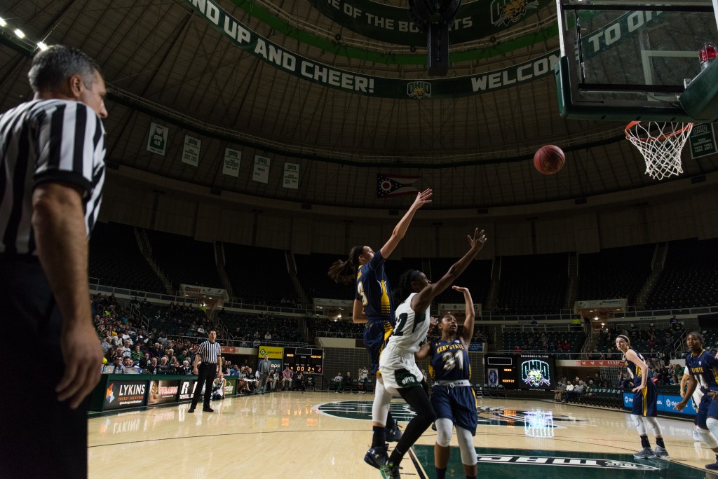 Yamonie Jenkins goes for a layup over Kent State's Megan Carter and Larissa Lurken during a Women's basketball game at the Convocation Center on January 14, 2017. Kent State defeated Ohio University 68-65. (Nickolas Oatley/WOUB)