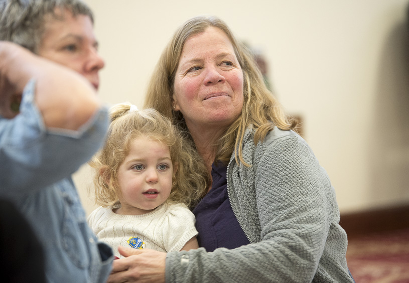 Elaina Johnson, 3, and her Grandmother Theresa Leite attend Ohio University's Islamic Centers breakfast on January 20, 2017. Leite said, "we came to feel a sense of positivity on this day." (Camille Fine/WOUB)