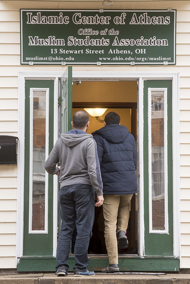 Two members of the Muslim Student Association walk into the Islamic Center for breakfast in Athens, Ohio on January 20, 2017. (Camille Fine/WOUB)
