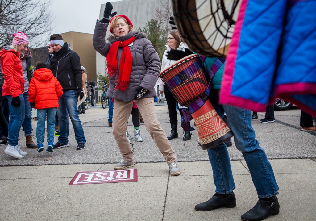 Shelly Pinnell, Marysville, Ohio, dances to the rhythms of a drum circle at the WMW Ohio Sister March on January 15, 2017, in Columbus, Ohio. (Erin Clark/WOUB)