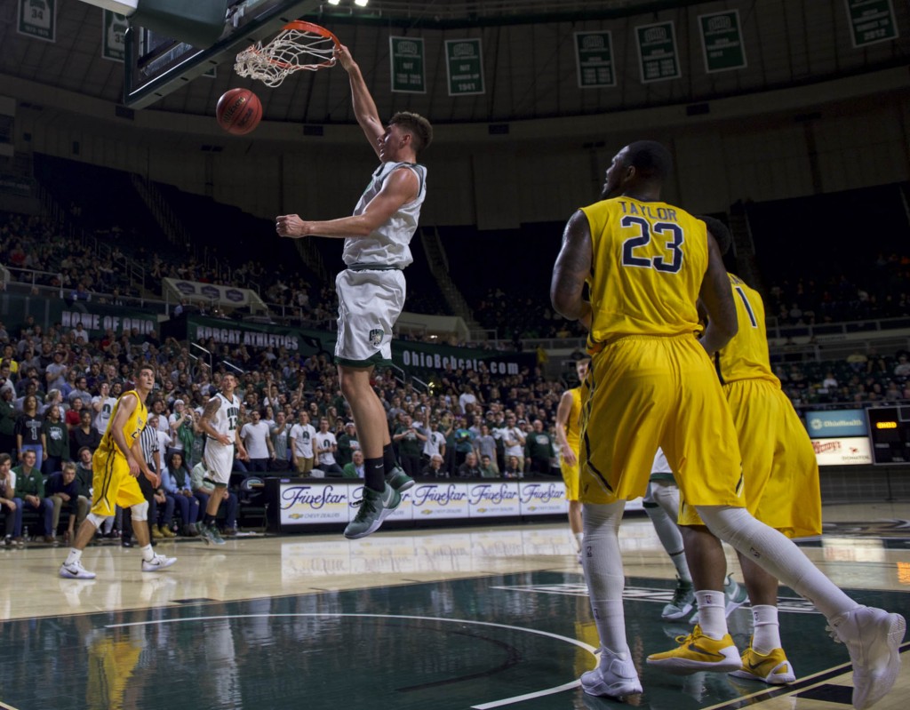 Jason Carter makes the play of the night as he beats two defenders at the baseline and finishes with a slam dunk during Ohio University's game against Toledo at the Convocation Center in Athens, Ohio on Tuesday, January 25, 2017. (Daniel Linhart/WOUB)