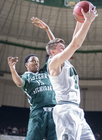 Jason Carter, Ohio University forward, gains control of the ball from Eastern Michigan at the Convocation Center on January 14, 2016. (Camille Fine/WOUB)