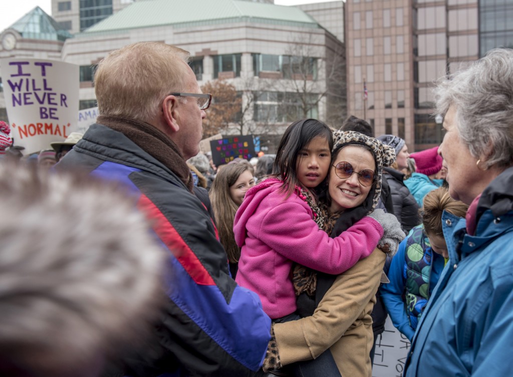 Former Governor of Ohio, Ted Strickland, left, and his wife Frances, right, talk with rally attendees at the WMW Ohio Sister March in Columbus, Ohio on Sunday afternoon, January 15, 2017. (Margo Sabec/WOUB)