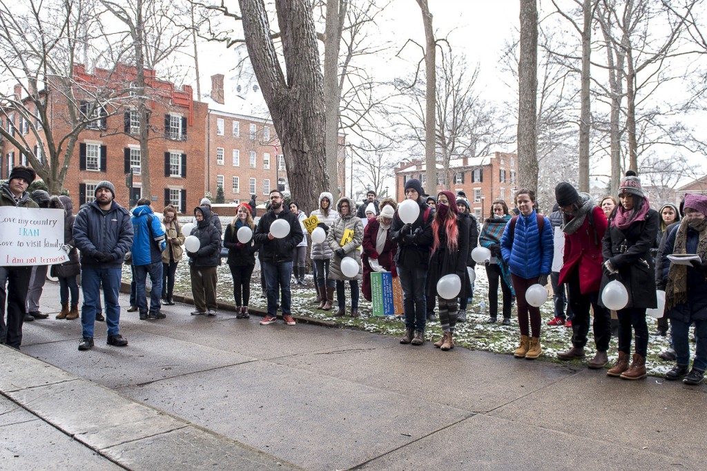 Thursday, February 9, 2017, students and faculty endure snow and frigid temperatures to protest the Immigration Ban. The rally was hosted by Ohio University Iranian Students Society, and held on Ohio University's North Green. (Margo Sabec/WOUB)