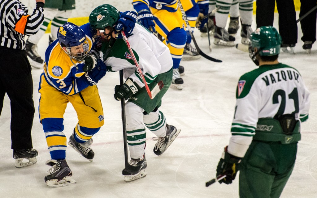 Tom Pokorney fighting University of Pittsburgh player, Brooks Antil, during the game n Bird Arena at Ohio University in Athens, Ohio,  on February 3, 2017. The bobcats won 9-0.
