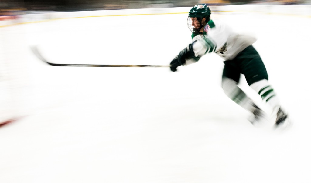 Ohio University player skating for the puck whiling playing against University of Pittsburgh in Bird Arena at Ohio University in Athens, Ohio,  on February 3, 2017. The bobcats won 9-0.