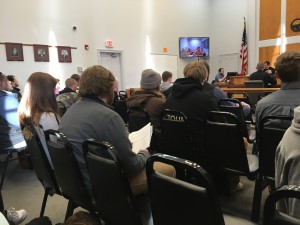 Students and others waiting to appear at Athens County Municipal Court  on Monday morning. Among those waiting was protesters from a Baker University Center sit-in Feb. 1. Susan Tebben / WOUB News