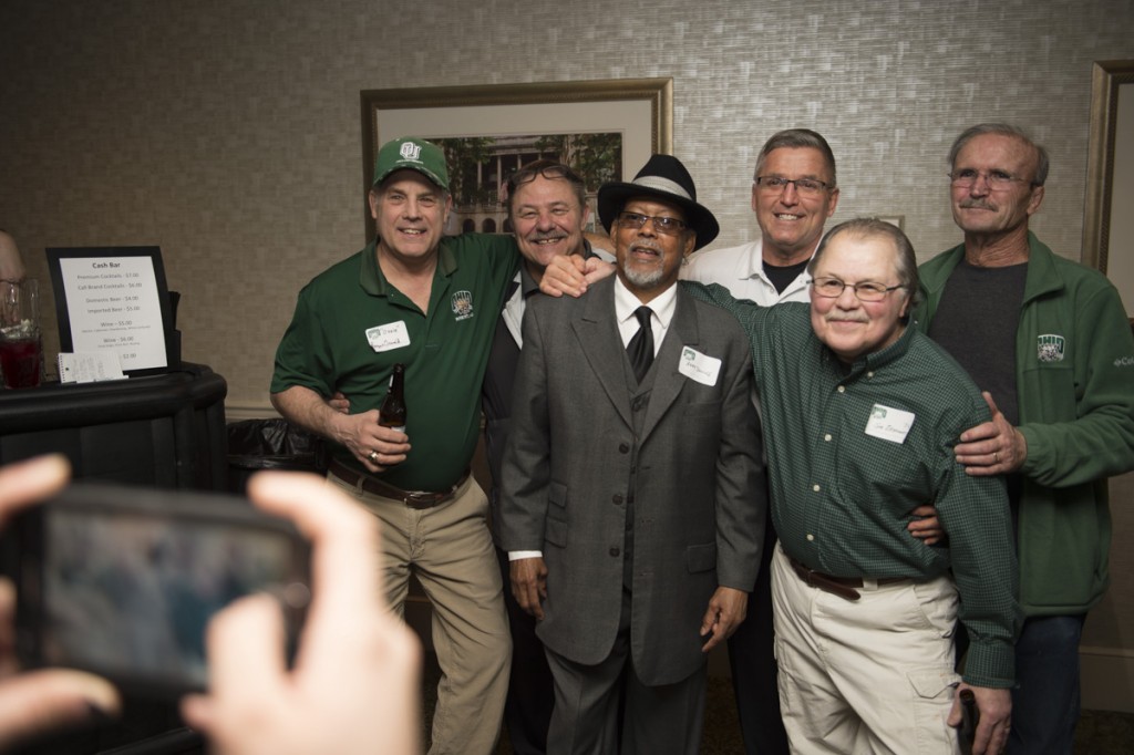 Former Ohio University wrestlers take a selfie during the Alumni get together. (Robert McGraw/WOUB)