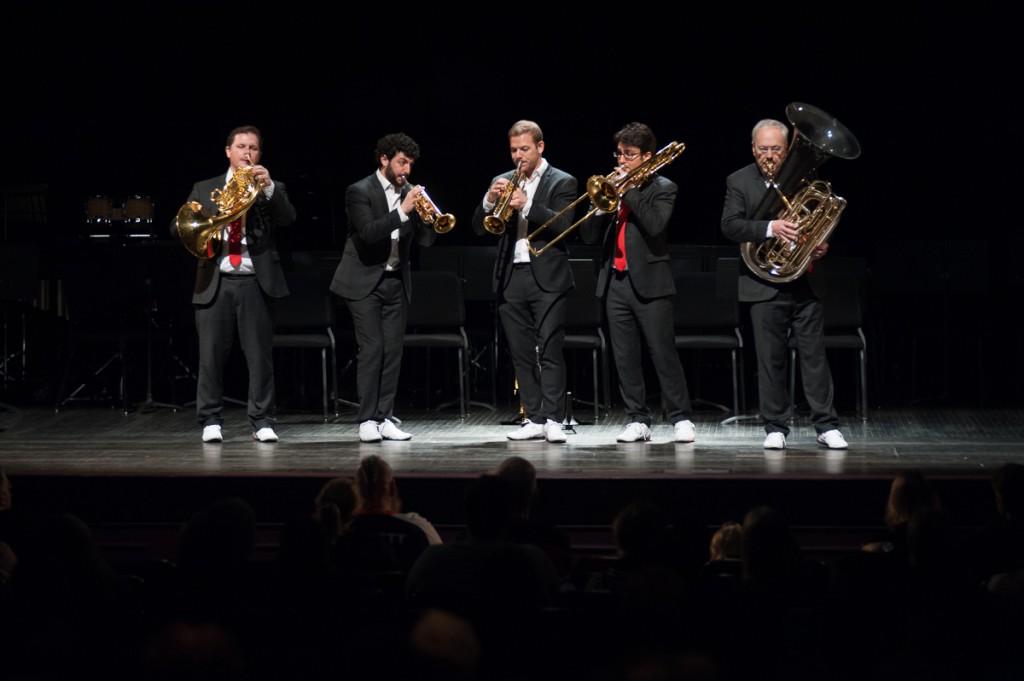 The Canadian Brass, comprised of Bernhard Scully, left, Chris Coletti, Caleb Hudson, Achilles Liarmakopoulos, and Chuck Daellenbach, plays a concert at Ohio University's Templeton-Blackburn Memorial Auditorium on Tuesday night on February 7, 2017. (Drake Withers/WOUB)