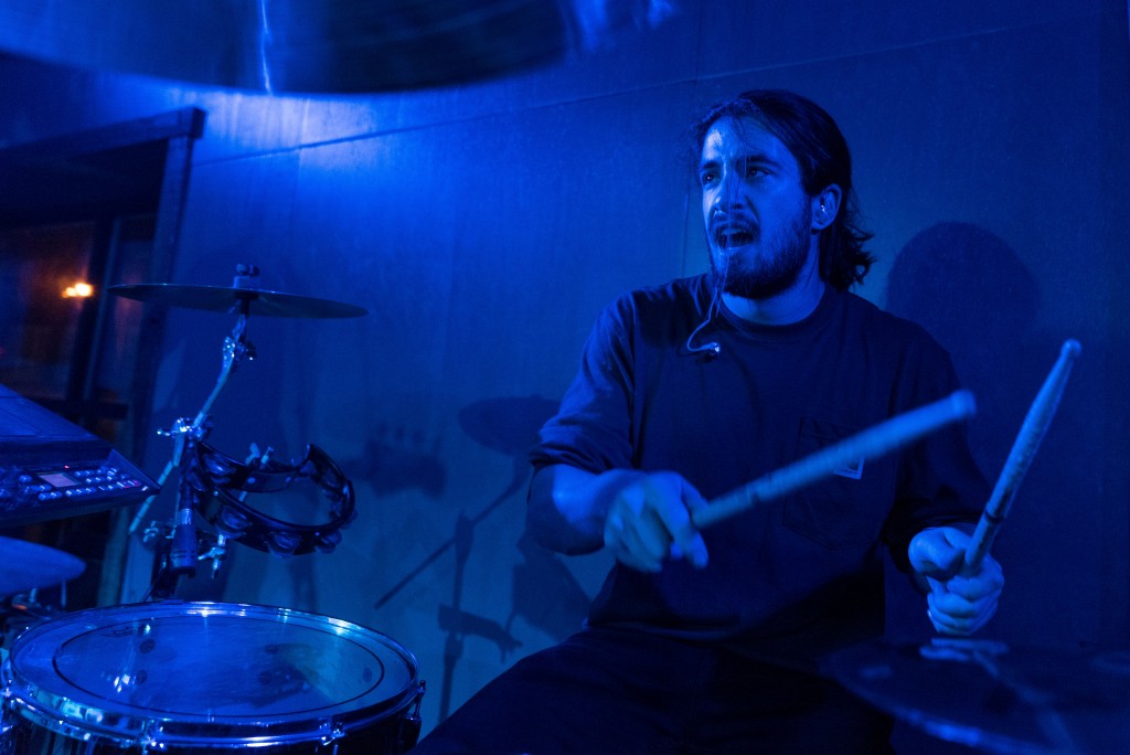 Zak Blumer of Clubhouse jamming out on the drums. (Nickolas Oatley/WOUB)
