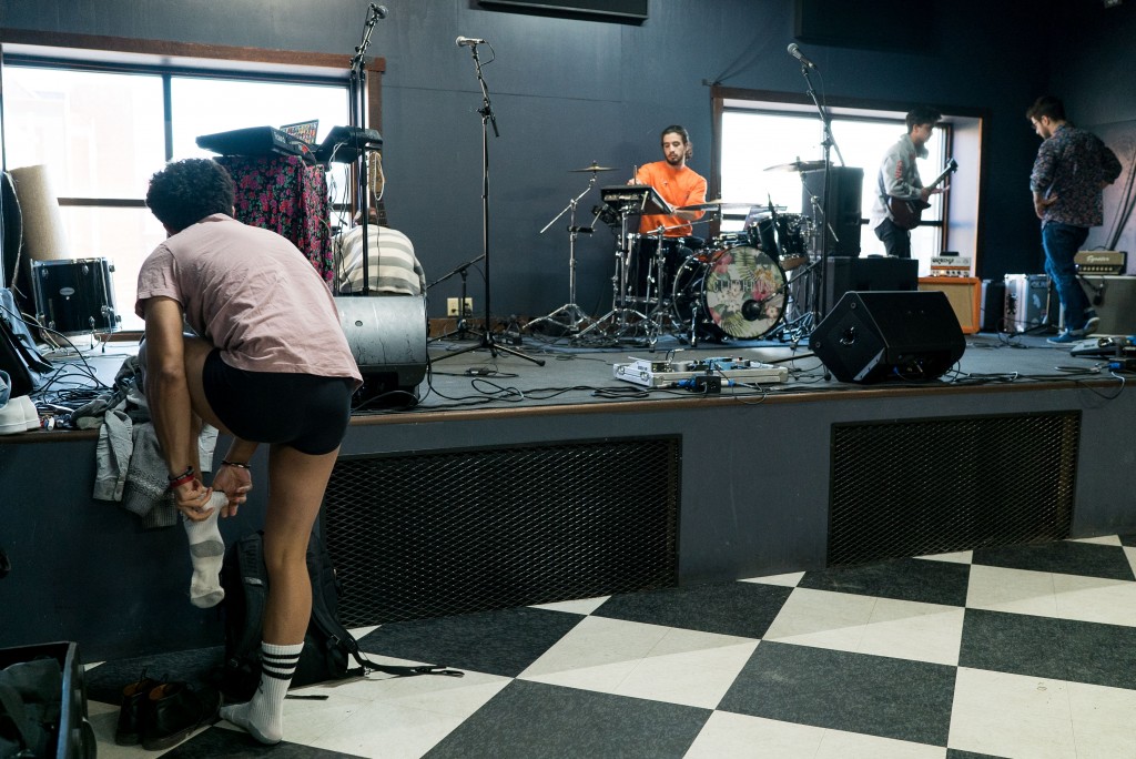 Band members from Clubhouse setup their gear for soundcheck at The Union Bar before the show. (Nickolas Oatley/WOUB)