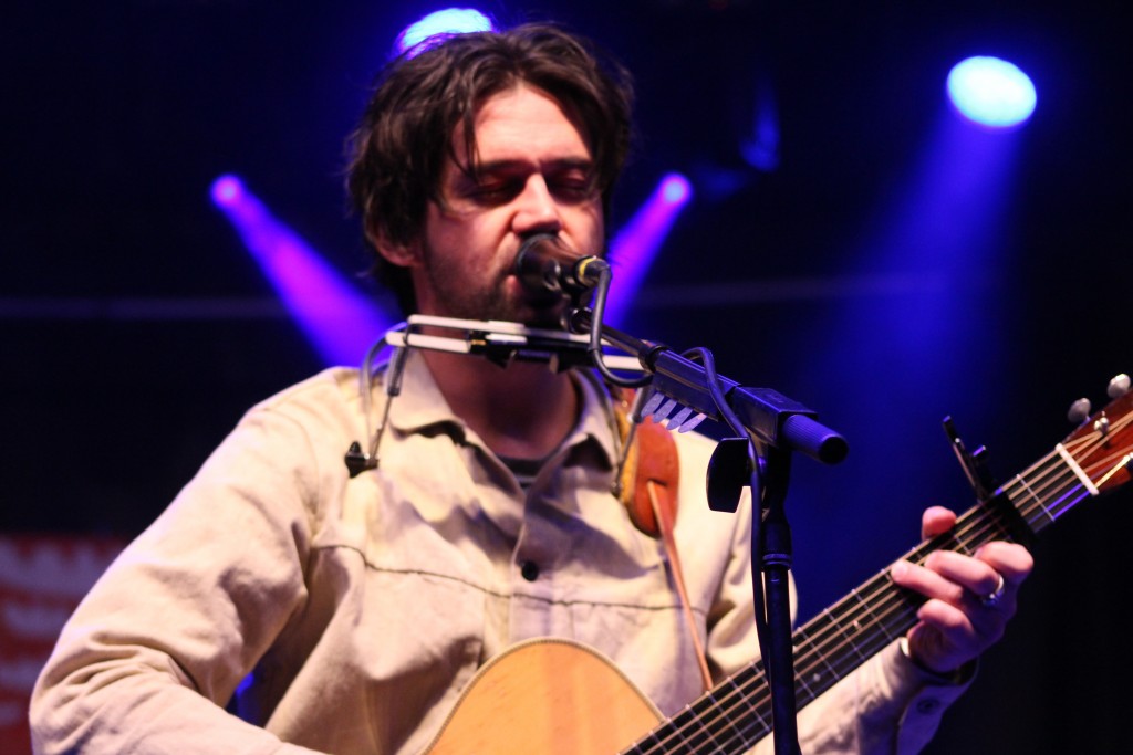 Conor Oberst performs on the main stage at the Nelsonville Music Festival. (WOUB/Marie Swartz)