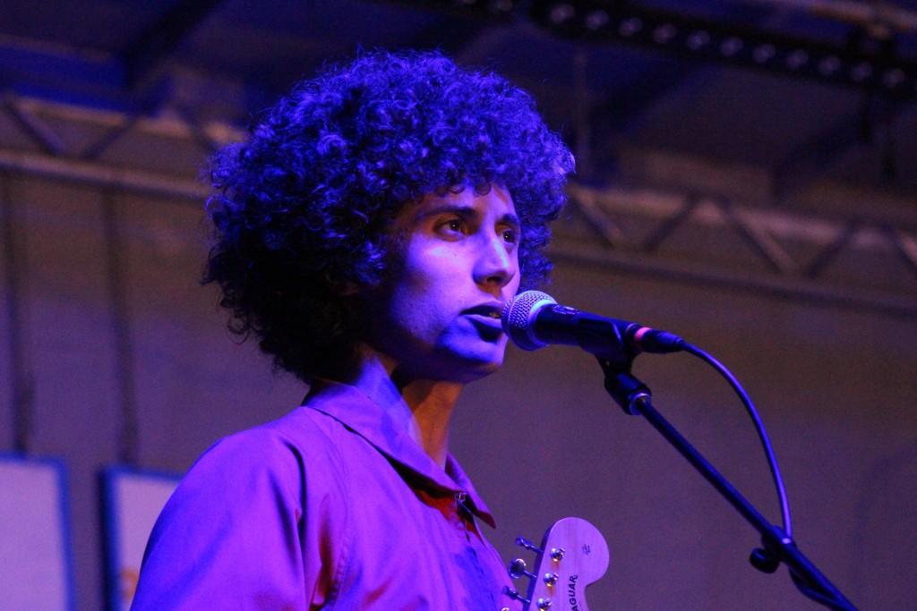 Ron Gallo performs on the Porch Stage Thursday night at the Nelsonville Music Festival. (WOUB/Marie Swartz)