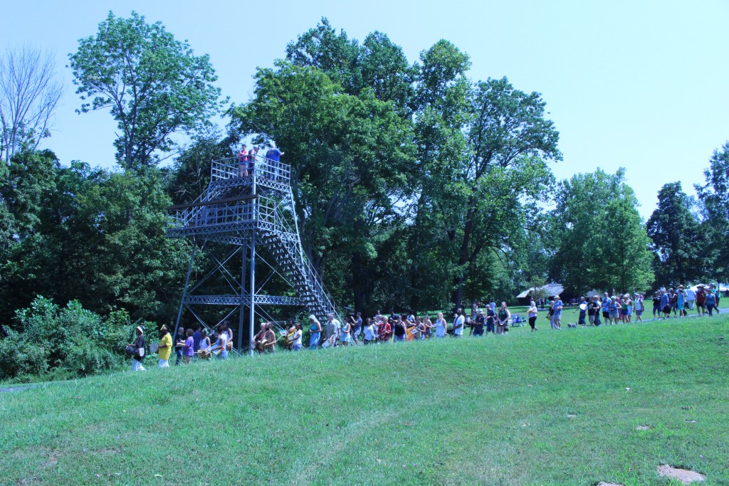 The lookout over the Great Serpent Mound grew populated as the time of the eclipse drew near. (WOUB/Emily Votaw)