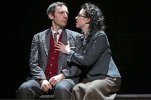 (l-r): Max Gordon Moore as Sholem Asch and Adina Verson as Madje Asch in INDECENT, a new play by Paula Vogel, co-created by Paula Vogel and Rebecca Taichman, and directed by Rebecca Taichman, at the Cort Theatre, 138 West 48th Street. © Carol Rosegg