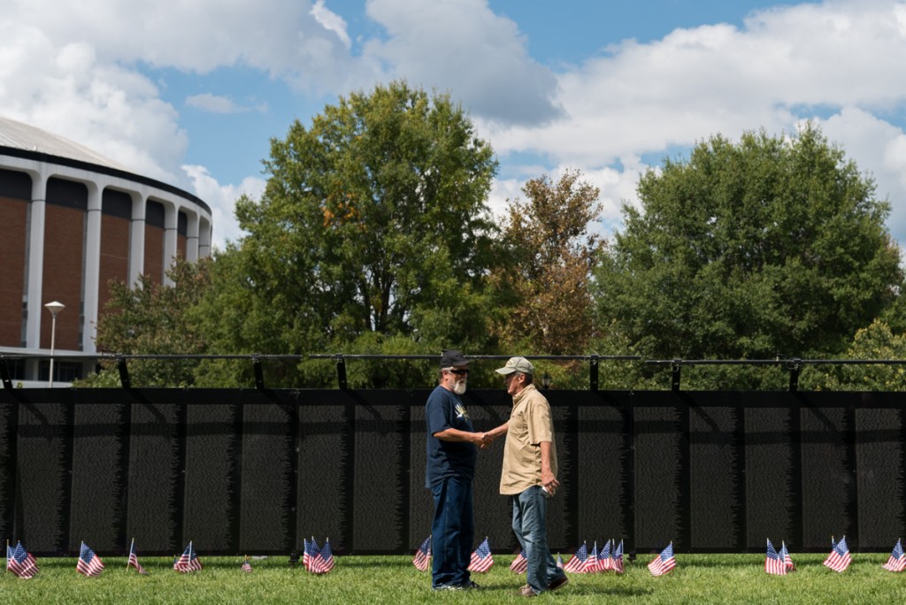 Veteran John Mitchell is thanked for his service in front of "The Wall That Heals" on September 16, 2017. (Nickolas Oatley/WOUB)