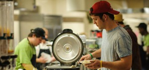 Ohio University student Martin Ernsberger gets oatmeal for dinner at Nelson Dining Hall. Photo by Brien Vincent.