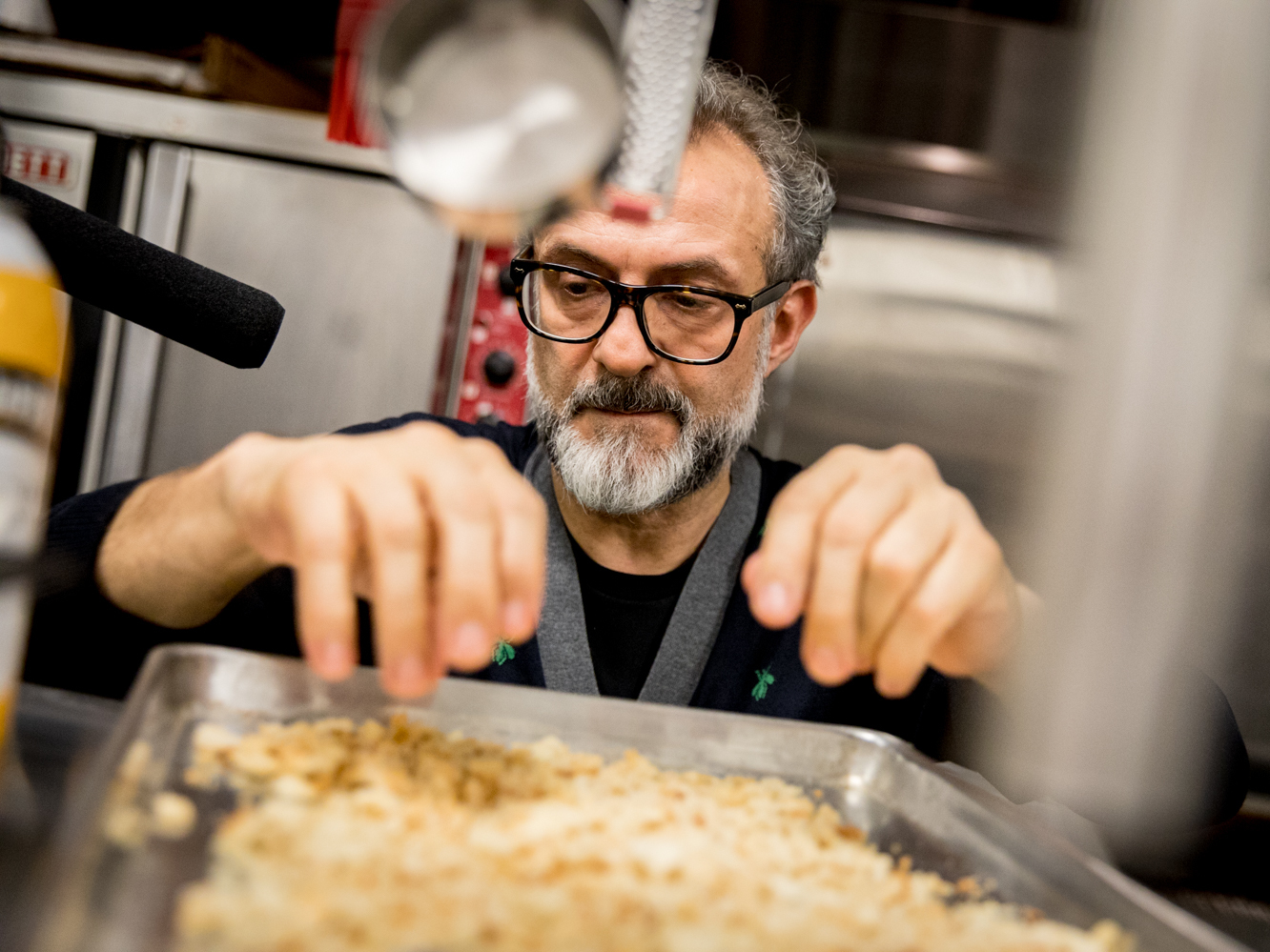 Chef Massimo Bottura creates a meal from Thanksgiving leftovers in NPR's kitchen. "The leftover is a big problem if you don't have a vision, if you don't have the knowledge of what you can do," he says. Above, he checks the breadcrumbs to make sure they're dry and fine enough to turn into a pasta called passatelli.